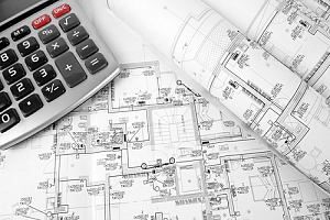 construction blue print and calculator