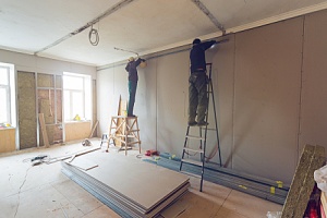 two contractors working on an office renovation